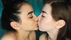 Sexy Lesbos Kiss and Finger Their Pussies